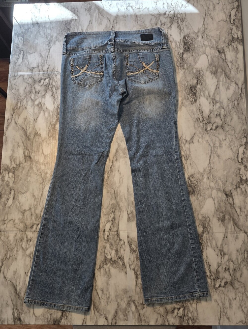 YMI Jeans Light Blue Boot Cut with Embroidered Back Pocket Size 9. Inseam 32 in.